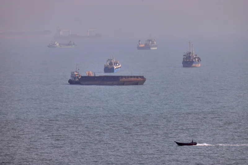 Commercial ships and military vessels near the Strait of Hormuz amid renewed U.S.-Iran attacks